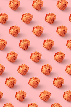 Crumpled orange paper balls pattern.