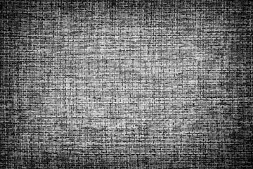 Fabric texture background. Vignette. Black and white. Close up.