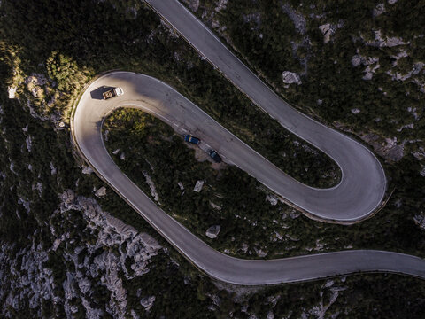 Cars on winding road