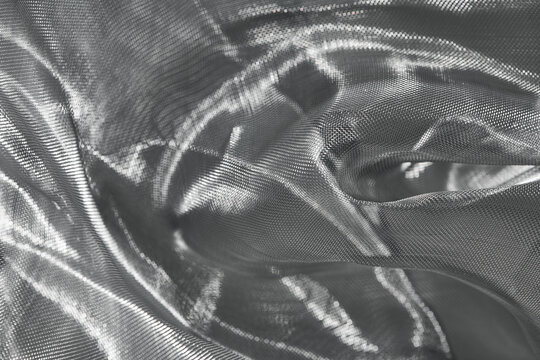 Wrinkled shiny material of silver mesh