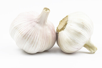 Heads of garlic by close up isolated on a white background.