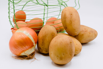 Onions, eggs and potatoes, Ingredients of a spanish potato omelette