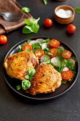 Fried chicken thighs with vegetables