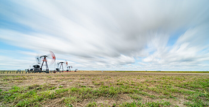 oil field pump in sunset