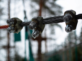 rope town. stretched safety metal cables