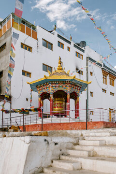 Prayer drum inside the courtyard of a Buddhist monastery