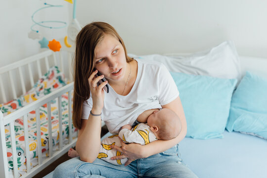 Mother Nursing Newborn Baby