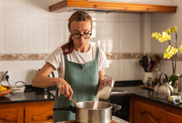 adding sugar to marmalade mixture