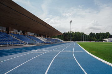 Blue Race Tracks In Sport Stadium