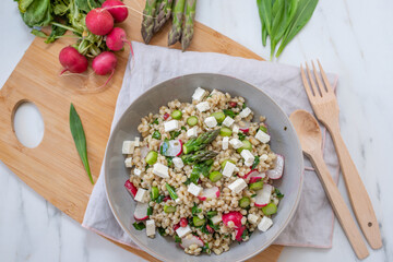 healthy spring salad with asparagus, barley and cheese