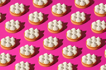 Many desserts on a pink background