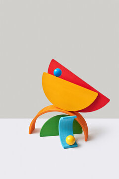 Balancing construction from wooden figures.