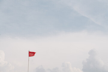 Red Flag On The Sky