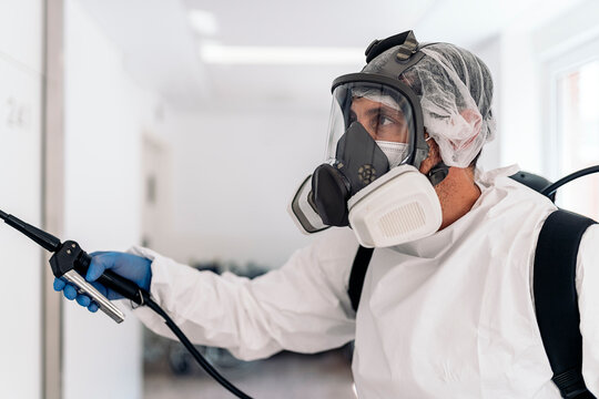 Worker Disinfecting Hospital