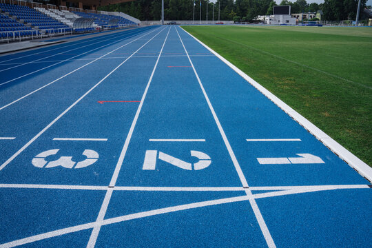 Blue Race Tracks In Sport Stadium