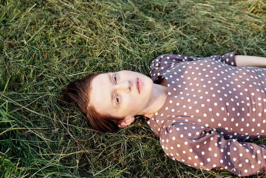 Girl laying on the grass
