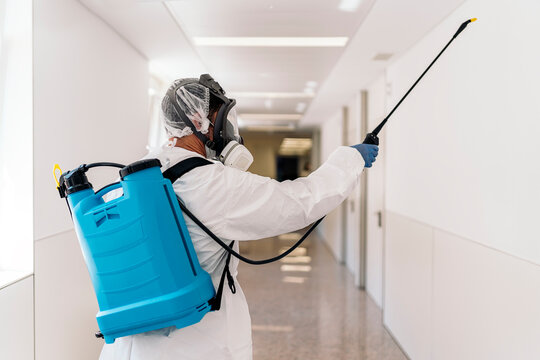 Worker Disinfecting Hospital