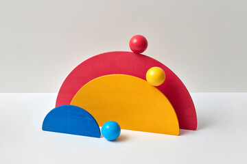 Wooden constructor - hemicpheres and small balls.