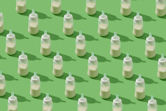 Plastic milk bottles pattern with shadows.