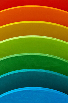 Creative rainbow colored wooden pattern.