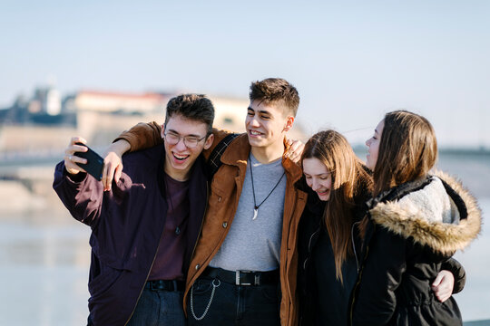 Teenage friends taking selfie