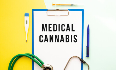 MEDICAL CANNABIS text on a letterhead in a medical folder on a beautiful background.