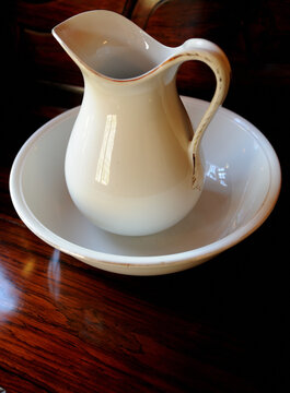 Old White Ceramic Hand Wash Basin And Water Pitcher