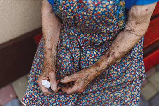 Wrinkled female arms