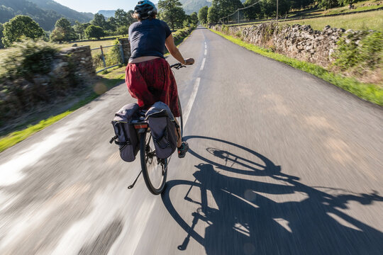 Woman On Bicycle From Behind