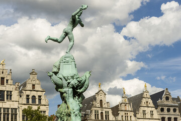 Guildhouses at the Grote Markt and Statue of Brabo and the giant's hand in Antwerp, Belgium