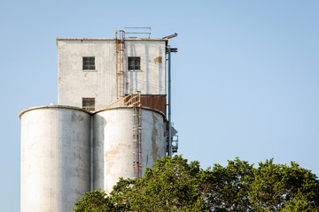 Top of an Old Grain Elevator against a Blue Sky