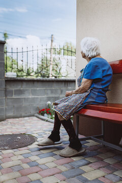 Grandmother sitting alone