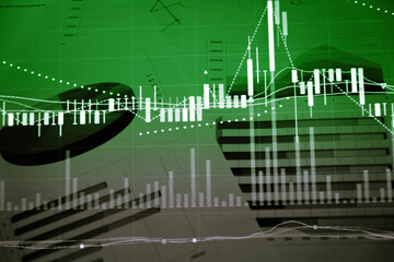 Charts of financial instruments with various type of indicators including volume analysis for professional technical analysis on the monitor of a computer. Fundamental and technical analysis concept.