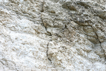 Rock textured stone. Cross bedded sandstone or gypsum with lots of layers
