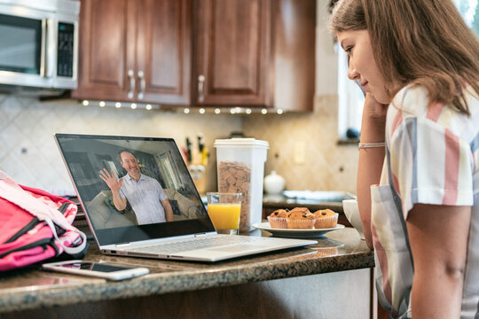 Morning: Teen Girl Watches Virtual Class From Home