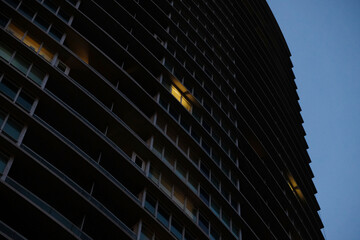 Night View of Condo Building - Mostly Dark