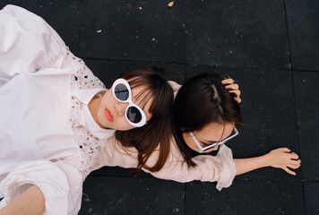 funny portrait of two fashionable women