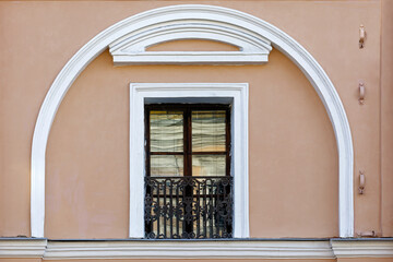 Window with a white arch.
