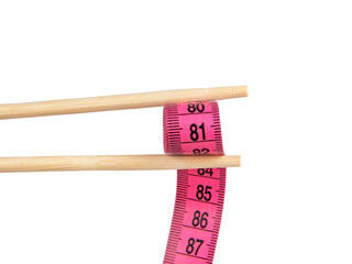 Bamboo sushi sticks with pink tape measure isolated on the white background