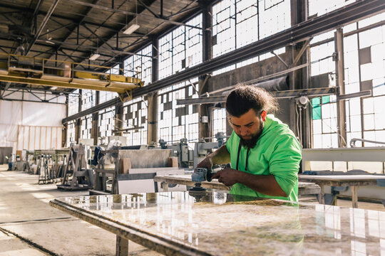 Hispanic Man at work at Industrial Company