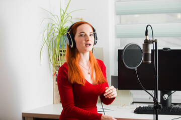 The announcer on the radio trains diction before the start of the broadcast