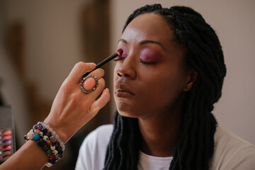 Make up artist applying make up