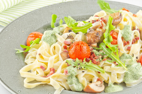 Tagliatelle pasta with rocket pesto mushrooms and ham series image 03