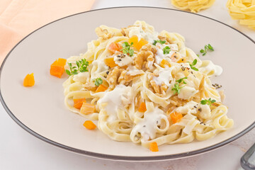 Tagliatelle pasta with walnuts and gorgonzola cheese sauce series picture 03