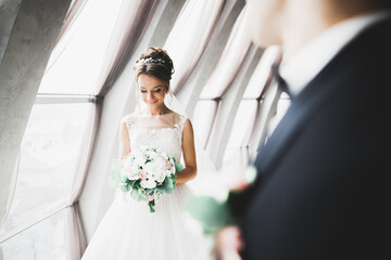 Portrait of a beautiful fashion bride, sweet and sensual. Wedding make up and hair