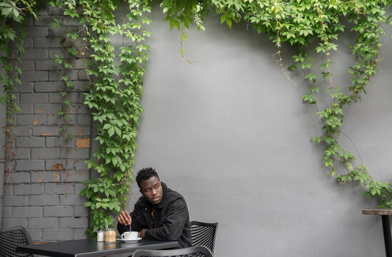 Man At Coffee Shop Terrace