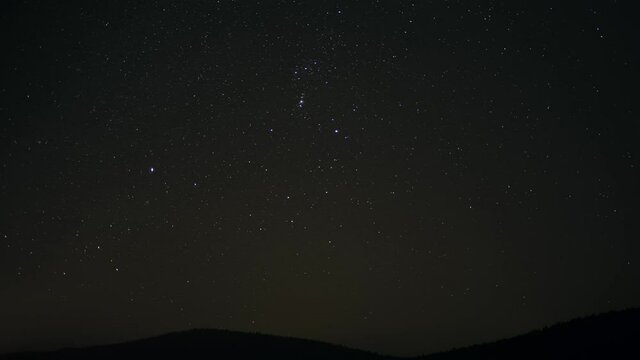 Stars moving on the night sky. Time lapse footage.
