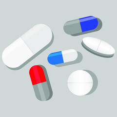 Different medical pills on gray background