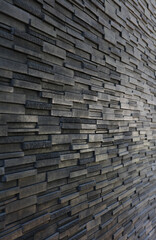 Pattern background od baclk brick wall, Abstract old wall build of gray stones at one of buildings