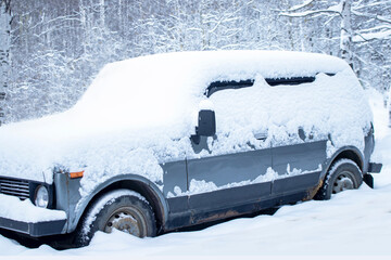  Car littered with snow.